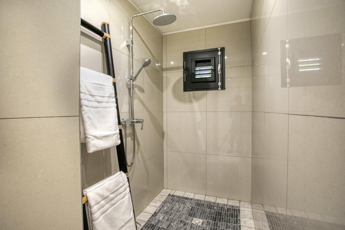 Location villa Saint Martin Mont Vernon - 6 chambres 14 personnes piscine vue mer salle de sport solarium terrain de pétanque (22)